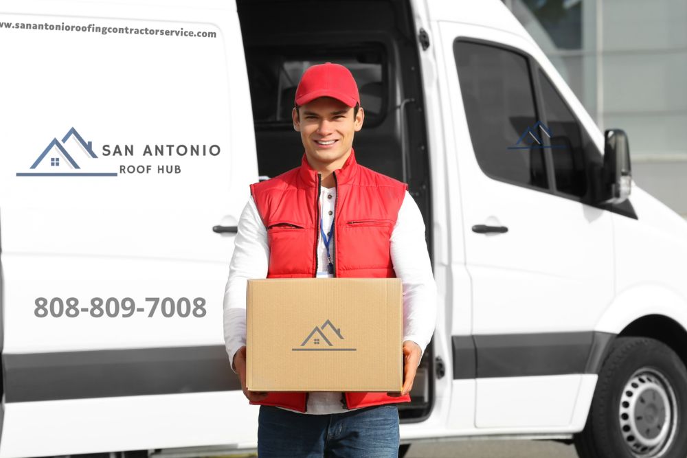 A man with a box in front of a van, symbolizing a roofing service based in San Antonio.